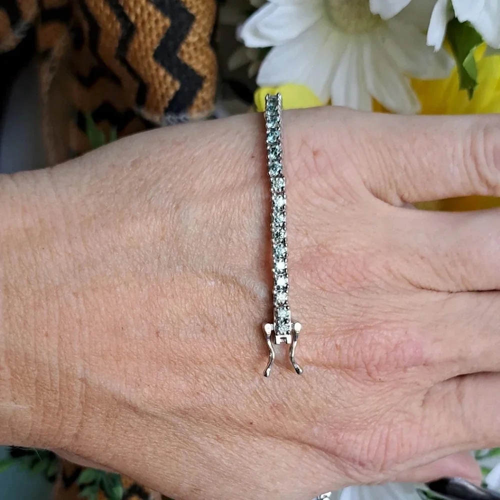 Genuine Blue Moissanite Tennis Bracelet In 925 Sterling Silver.